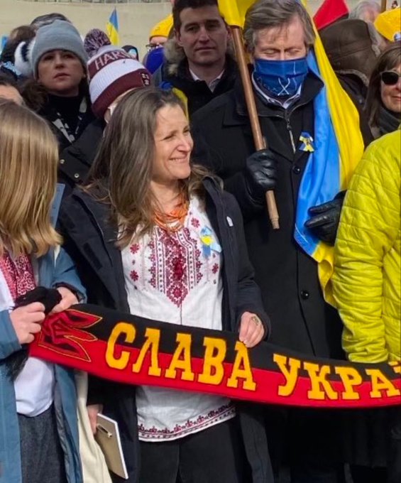 Chrystia Freeland-Ukraine-NAZI Canadian Deputy PM participating in a Ukraine rally in Canada, proudly holding a NAZI symbol of pride.
